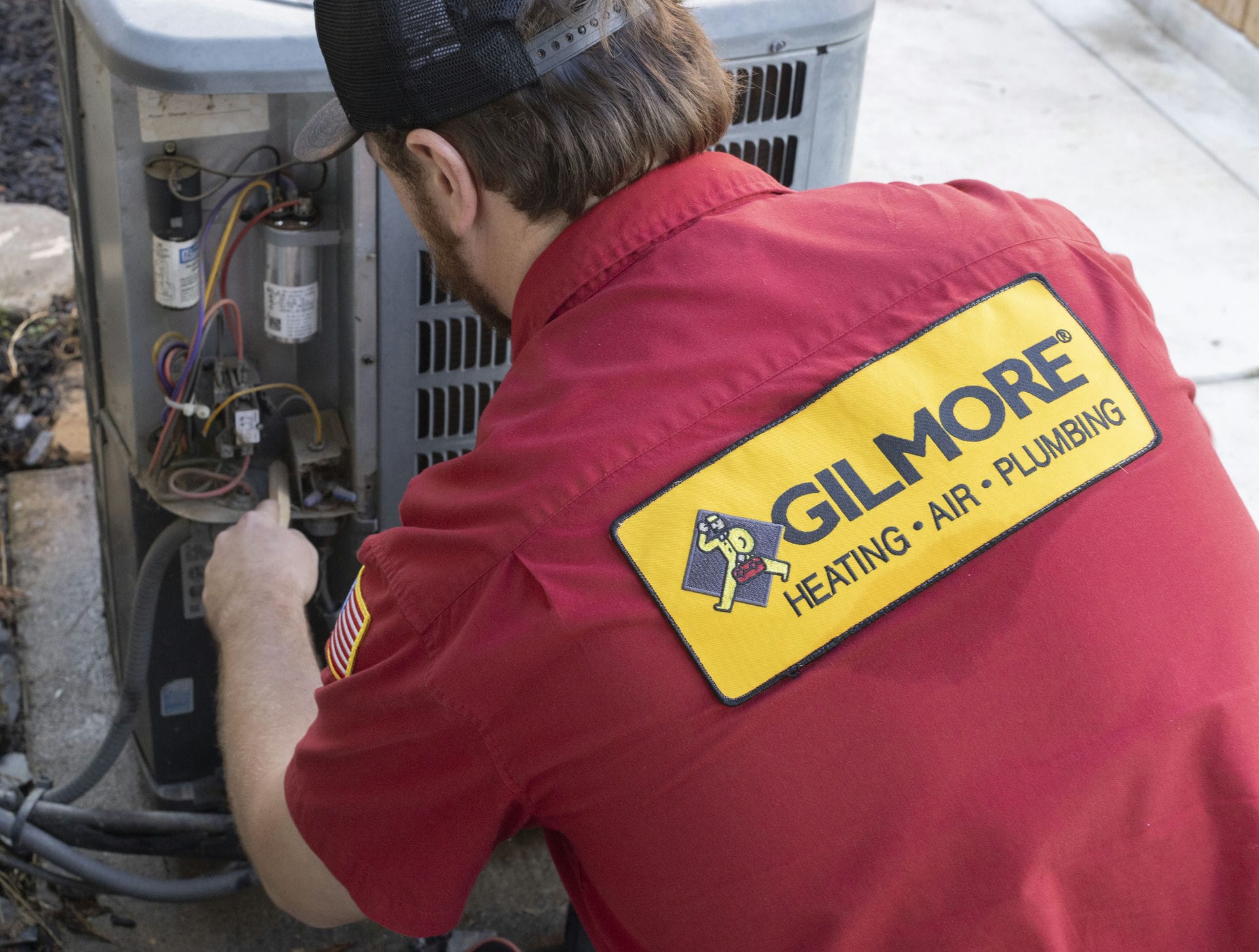 Gilmore Heating Air and Plumbing Technician at work